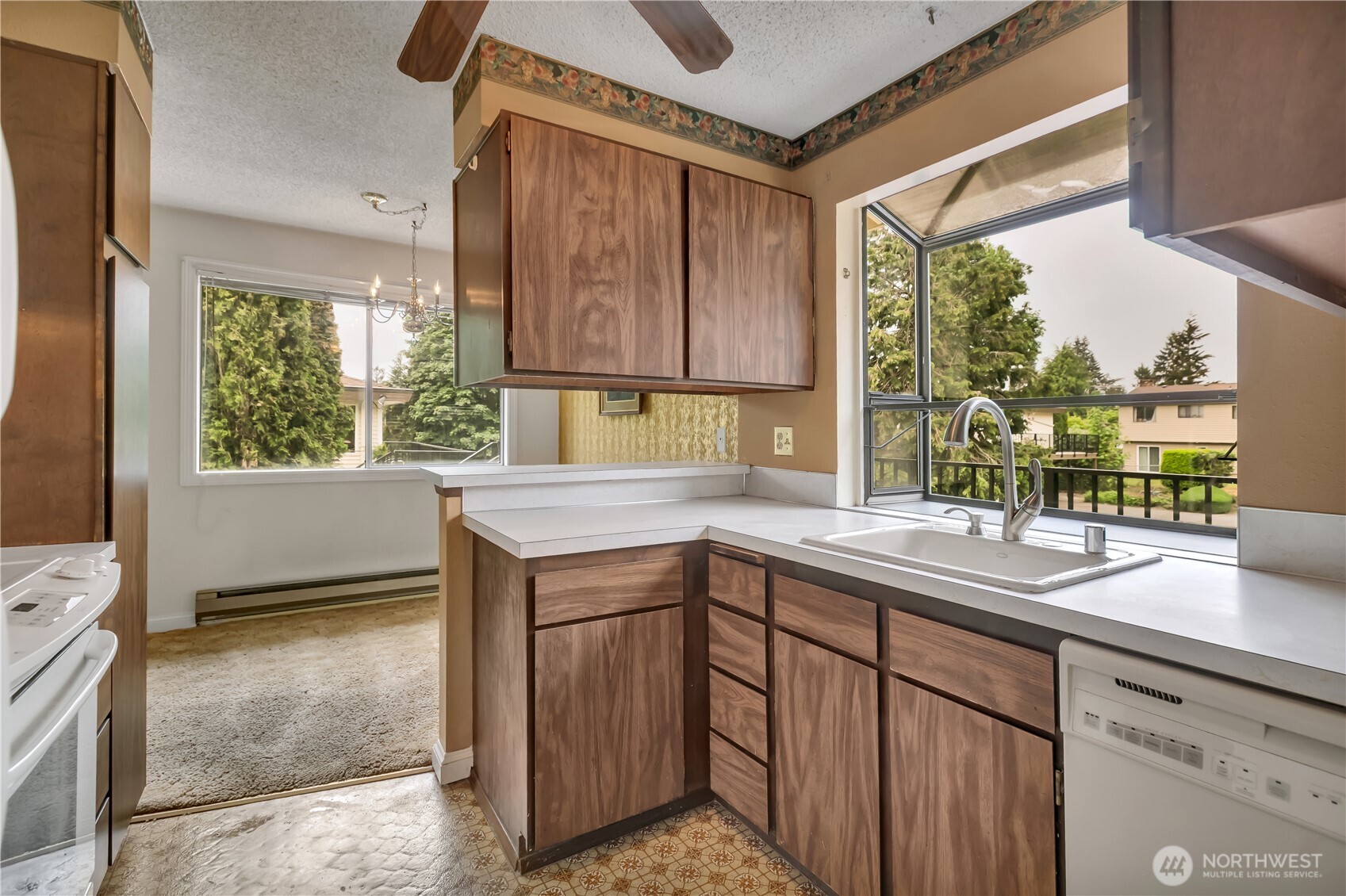 412 213th Place Southwest, Unit 21D Bothell, WA 98021 - Photo 16 of 28 a kitchen with a sink and a window