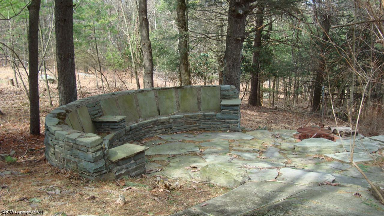 387 Valley View Road Cresco, PA 18326 - Photo 9 of 9 Charming Bench and Fire Pit
