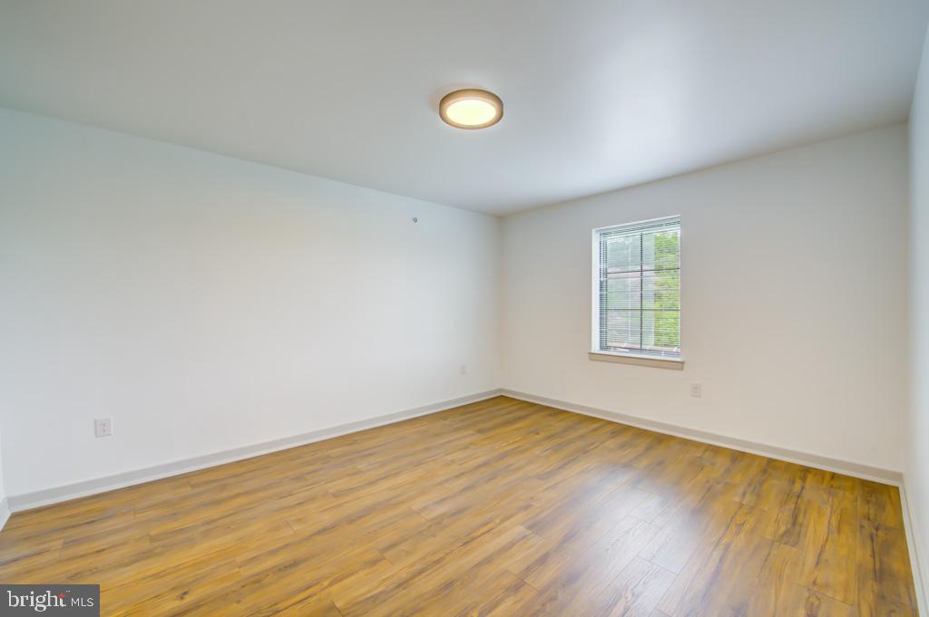 5001 Umbria Street, Unit P607 Philadelphia, PA 19128 - Photo 5 of 10 wooden floor in a room