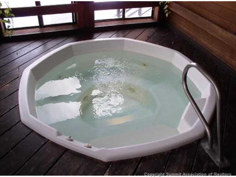 9876 Ryan Gulch Road, Unit 303F Silverthorne, CO 80498 - Photo 6 of 22 Hot Tub. Perfect clubhouse where you can relax after a day on the mountain!