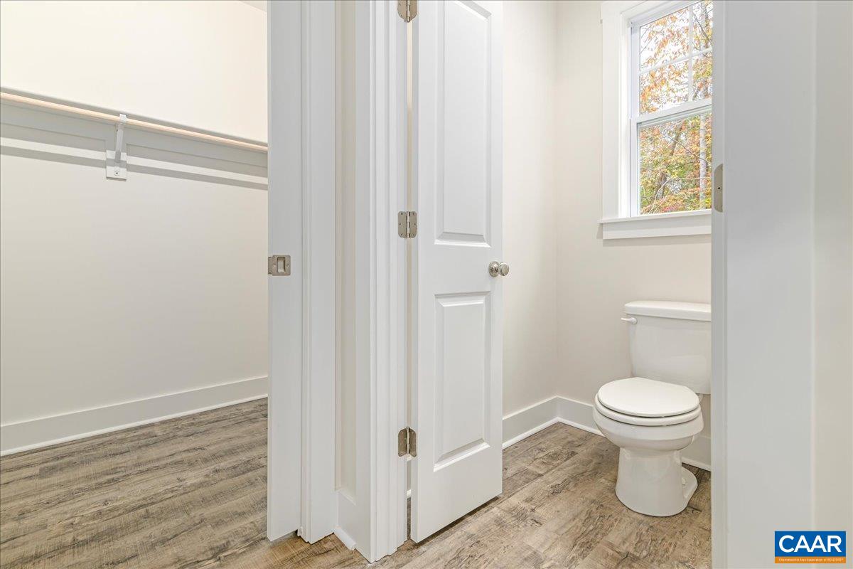 6443 Bremo Road Bremo Bluff, VA 23022 - Photo 23 of 31 a bathroom with a toilet and a view of bathroom