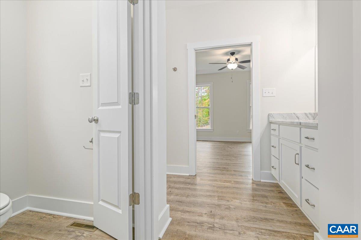 6443 Bremo Road Bremo Bluff, VA 23022 - Photo 24 of 31 a view of hallway with wooden floor