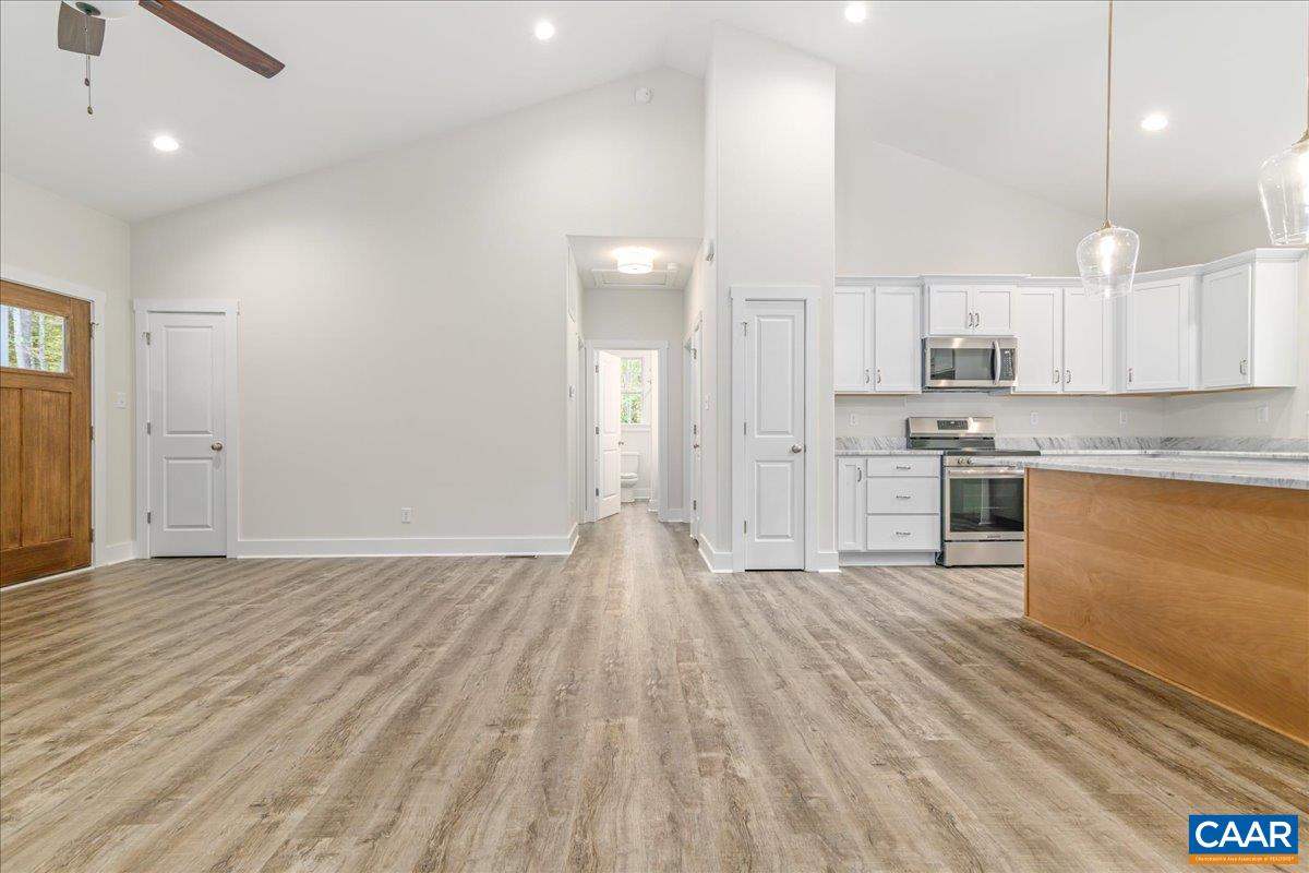 6443 Bremo Road Bremo Bluff, VA 23022 - Photo 8 of 31 a view of kitchen with wooden floor and window