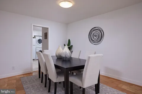a view of a table and chairs in a room