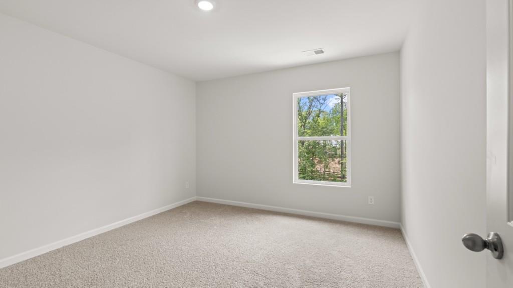 174 Thompson Ridge Lane Dallas, GA 30132 - Photo 22 of 35 an empty room with a window