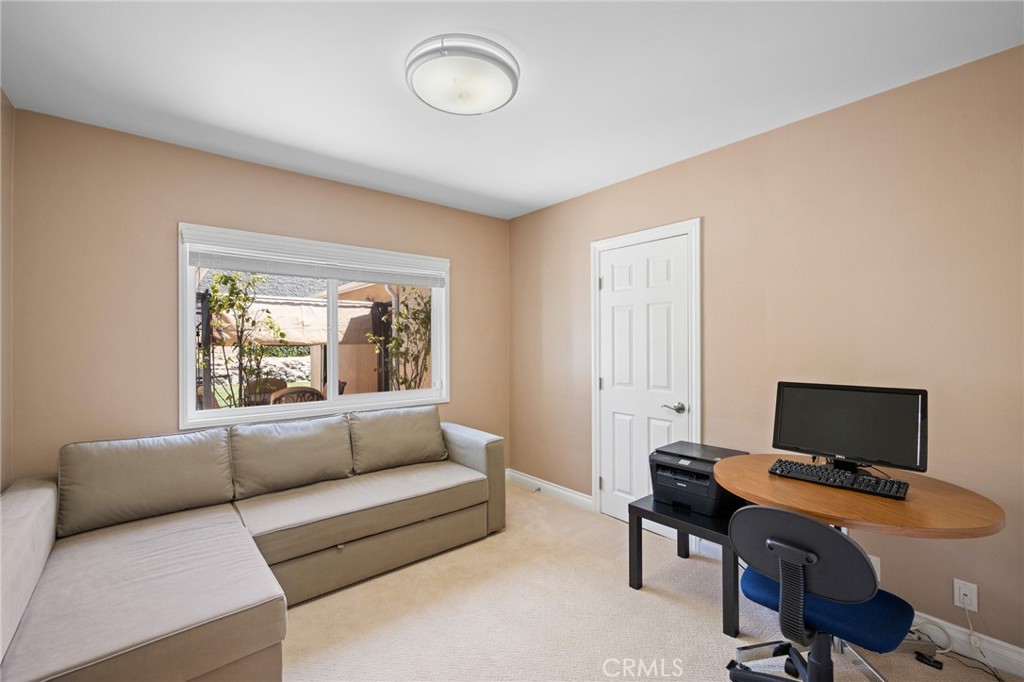 724 San Luis Rey Road Arcadia, CA 91007 - Photo 12 of 15 a view of a livingroom with workspace and a window