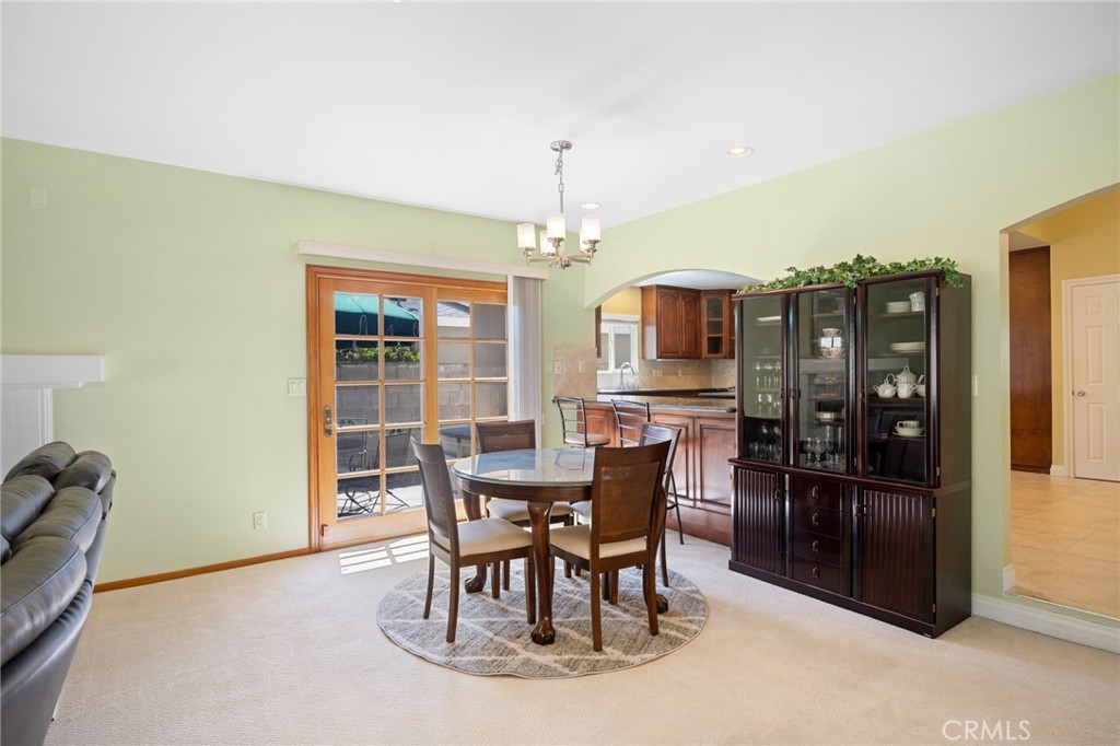 724 San Luis Rey Road Arcadia, CA 91007 - Photo 5 of 15 a view of a dining room with furniture and chandelier