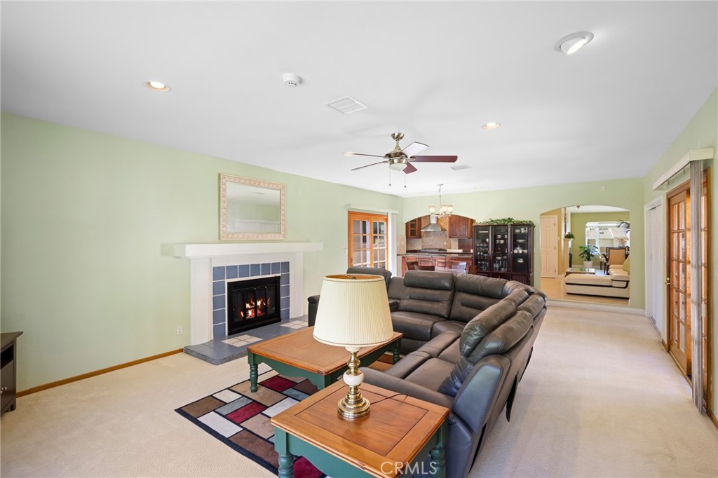724 San Luis Rey Road Arcadia, CA 91007 - Photo 6 of 15 a living room with furniture and a fireplace