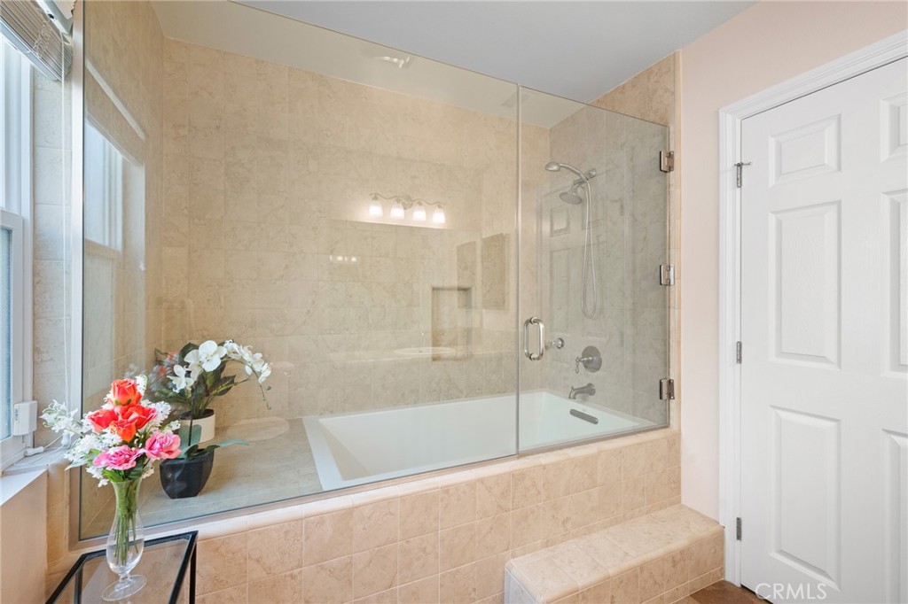 724 San Luis Rey Road Arcadia, CA 91007 - Photo 7 of 15 a bath room with a bathtub and a shower