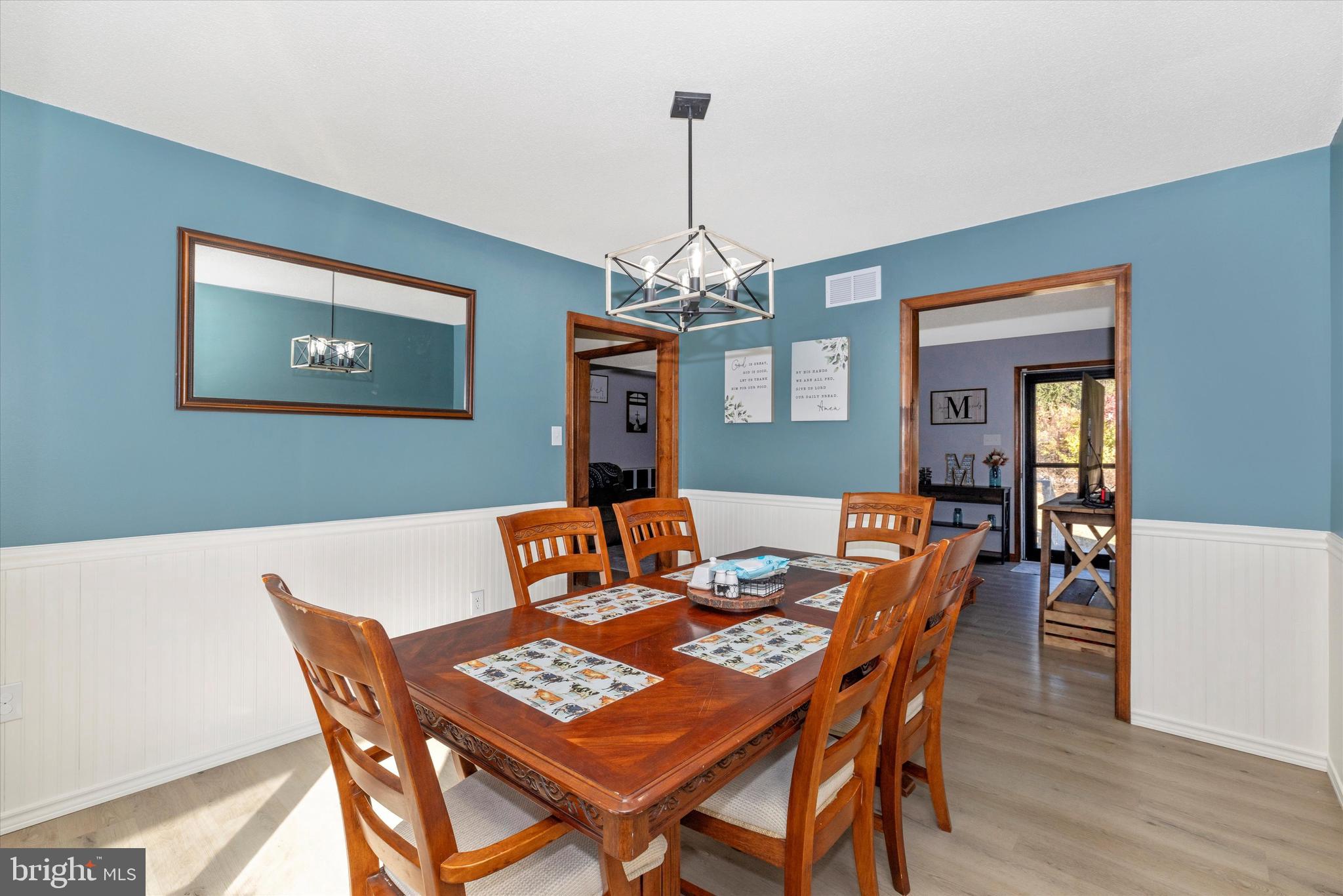 292 Bridget Road Martinsburg, WV 25404 - Photo 12 of 49 a view of a dining room with furniture window and wooden floor