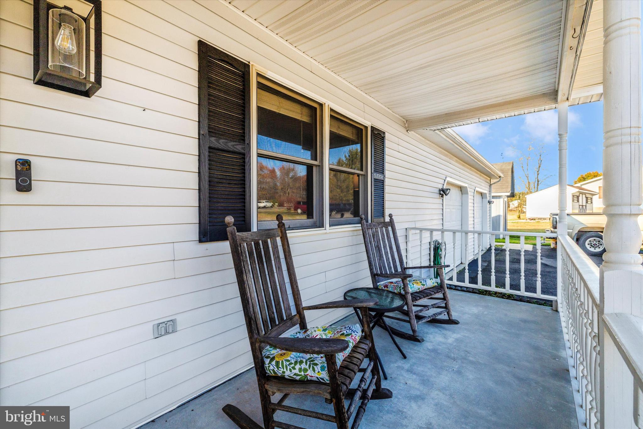 292 Bridget Road Martinsburg, WV 25404 - Photo 42 of 49 a view of a chair and tables in the patio