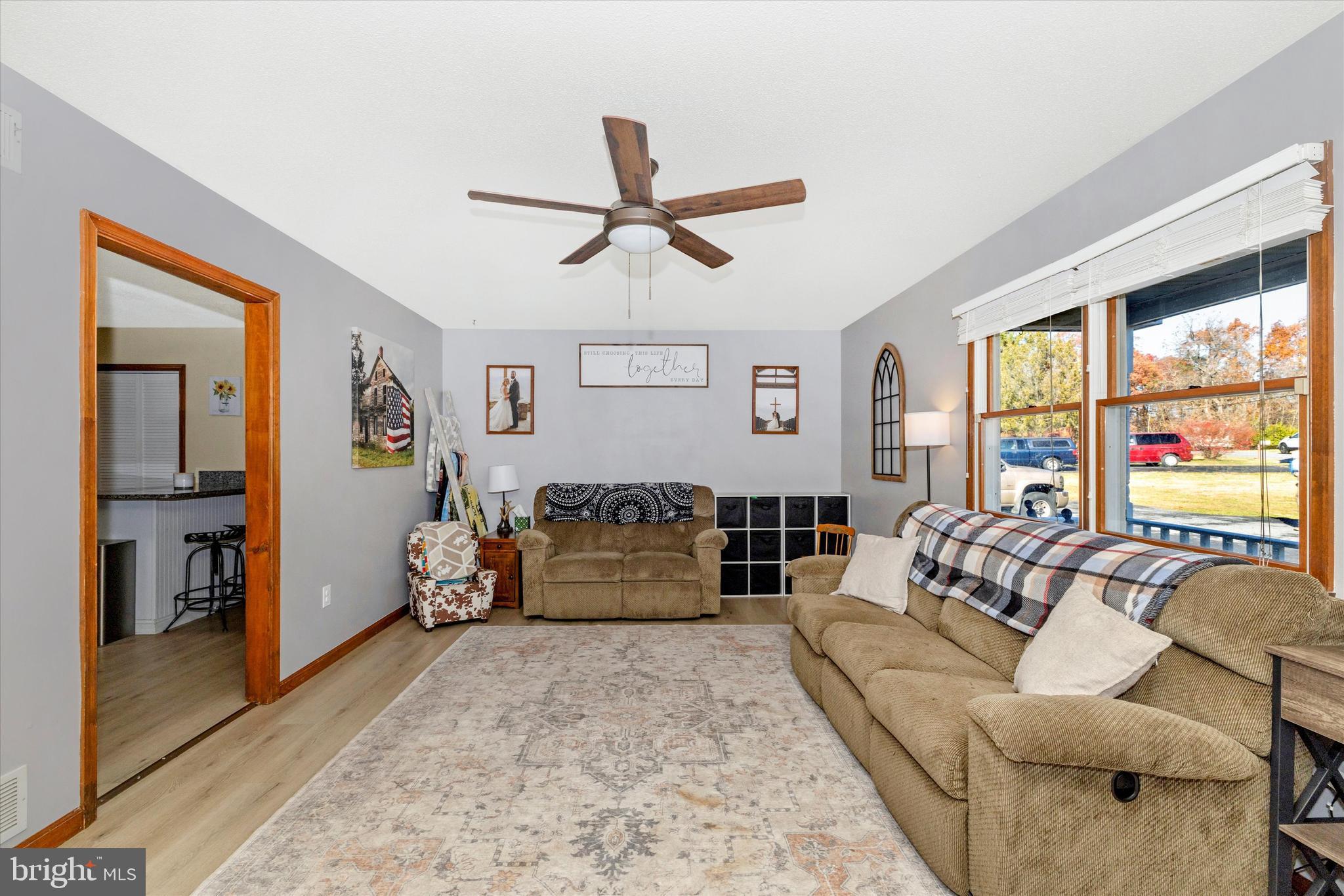 292 Bridget Road Martinsburg, WV 25404 - Photo 6 of 49 a living room with furniture and a large window