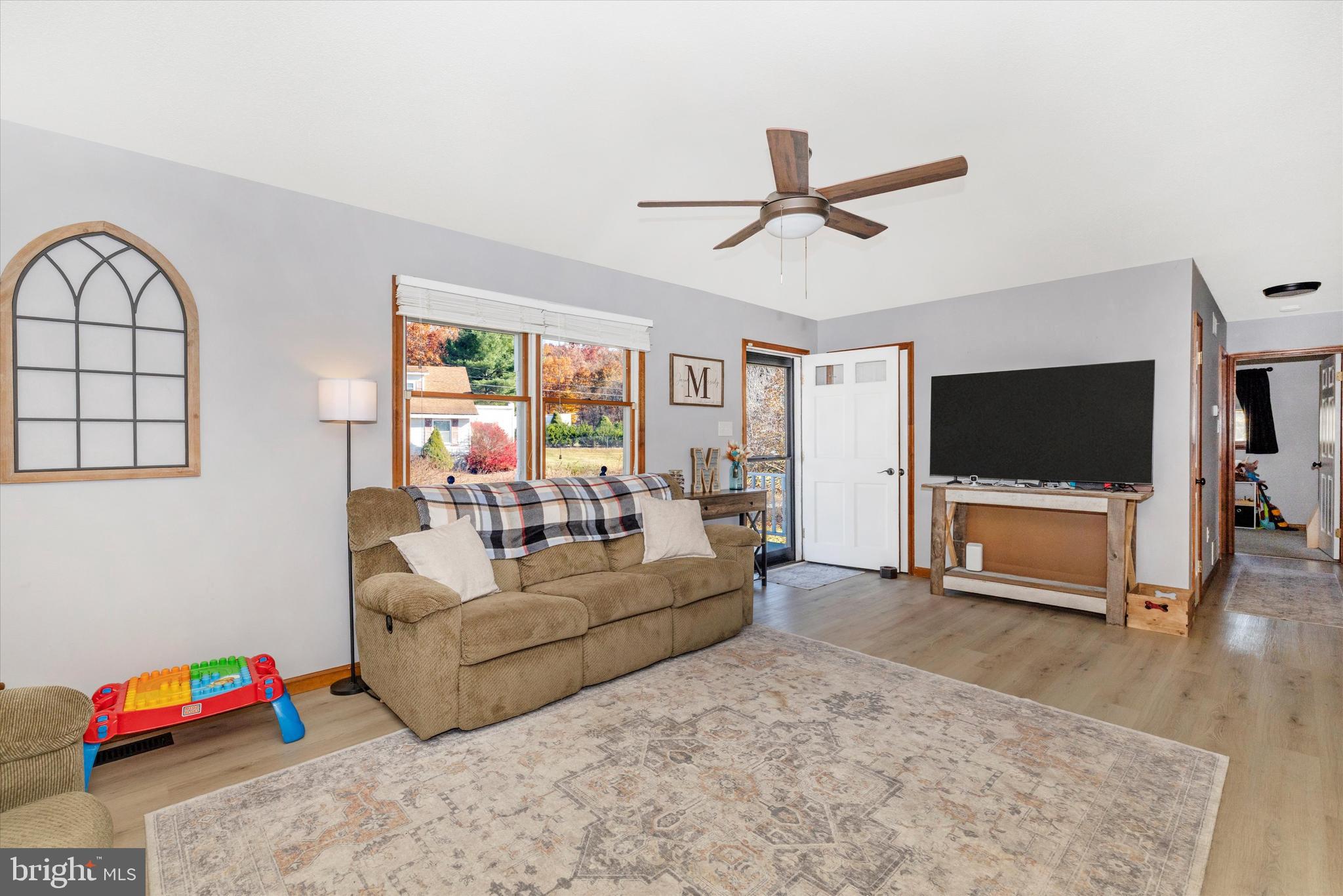 292 Bridget Road Martinsburg, WV 25404 - Photo 8 of 49 a living room with furniture and a flat screen tv