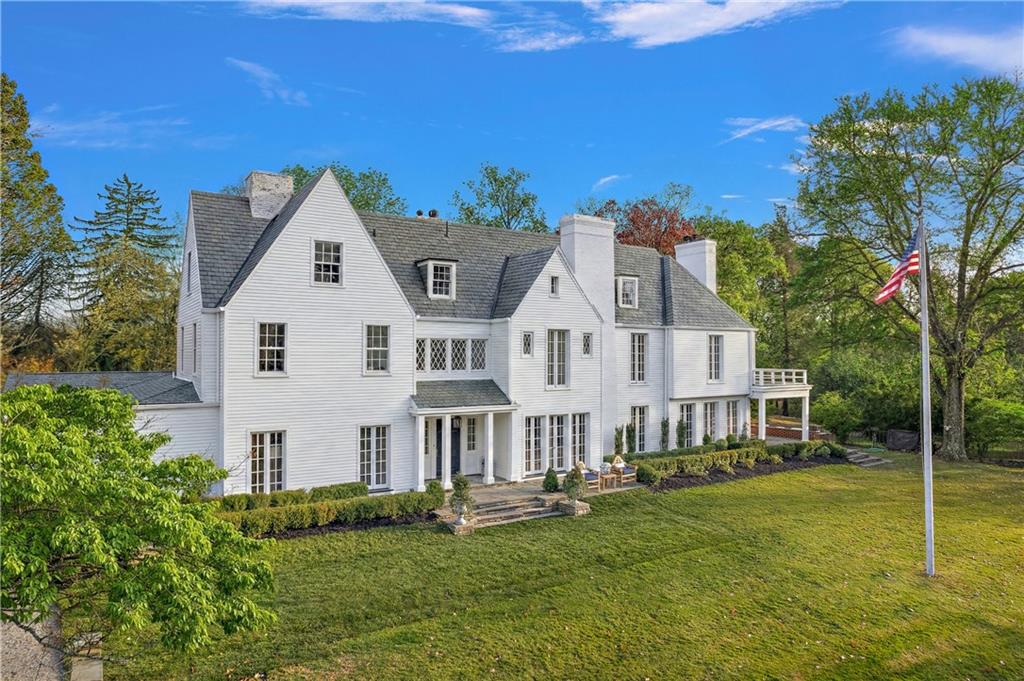 a view of a house with a big yard