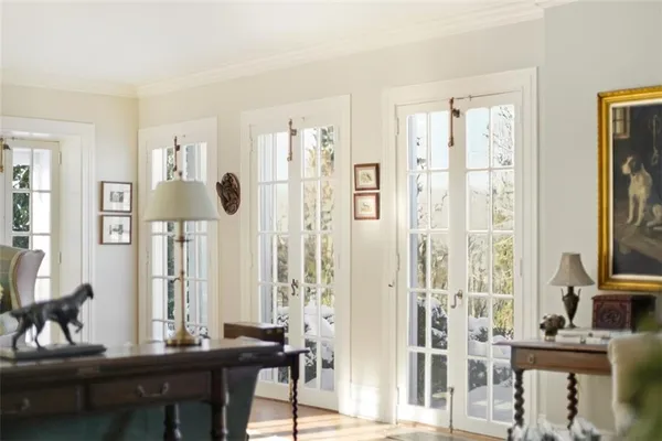 a living room with furniture and a window