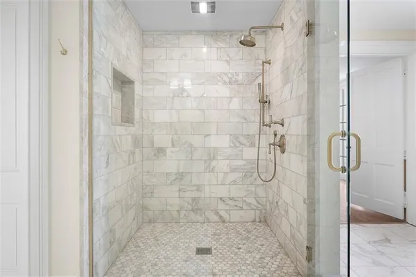 a bedroom with a bed and a closet