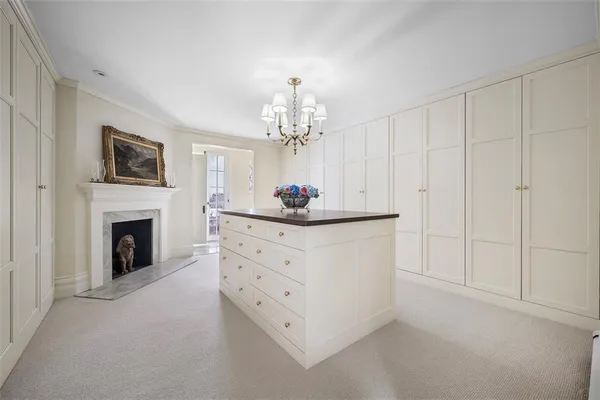 a view of a chairs and table in patio