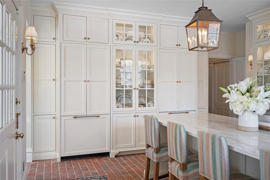 526 Scaife Road Sewickley, PA 15143 - Photo 7 of 50 a view of a hallway with wooden floor and cabinet