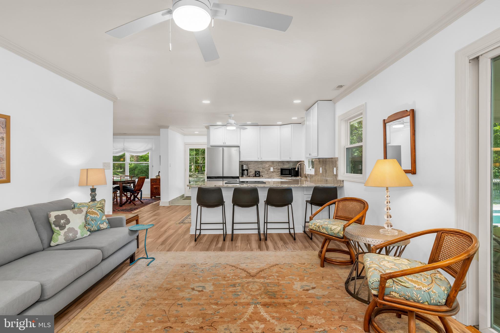 9459 New Road McDaniel, MD 21647 - Photo 11 of 27 a living room with furniture and kitchen view