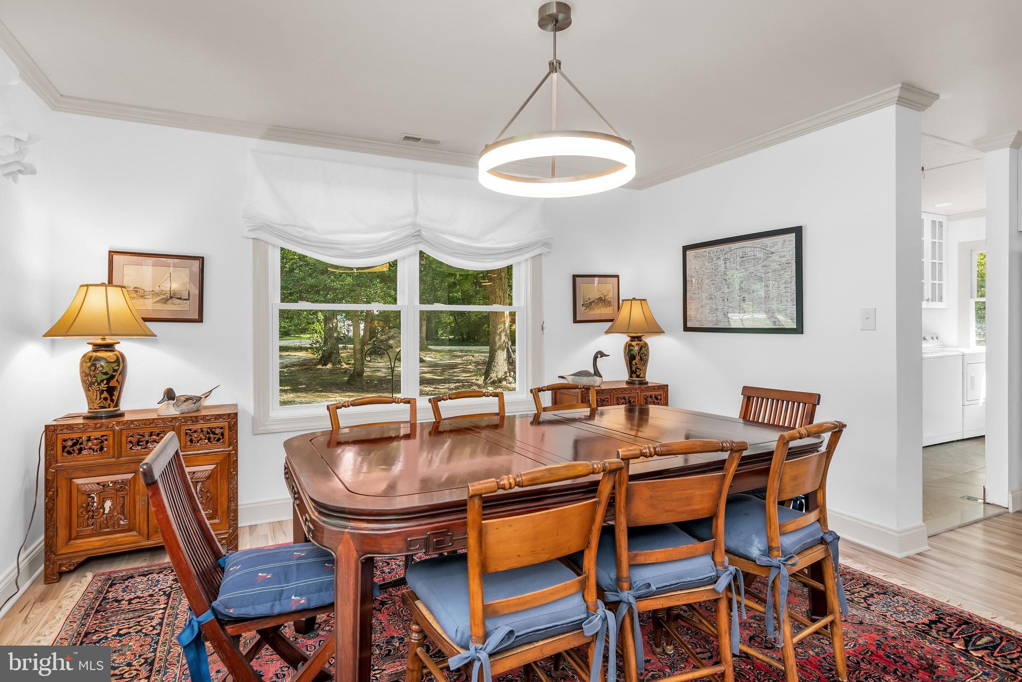 9459 New Road McDaniel, MD 21647 - Photo 13 of 27 a dining room with furniture and window