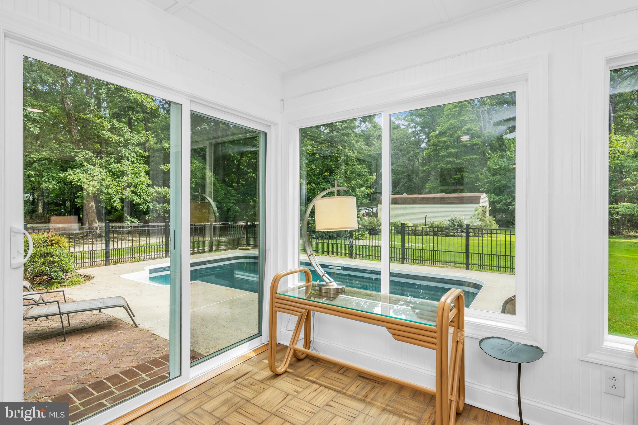 9459 New Road McDaniel, MD 21647 - Photo 18 of 27 a view of a room with wooden floor and windows