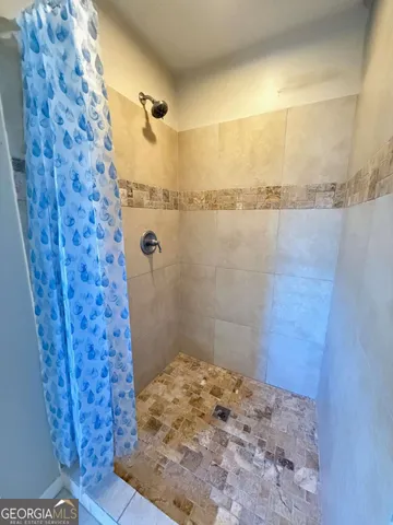 a view of a bathtub in a bathroom