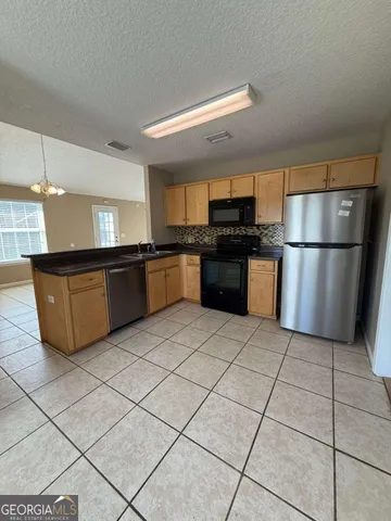 a view of an empty room with window