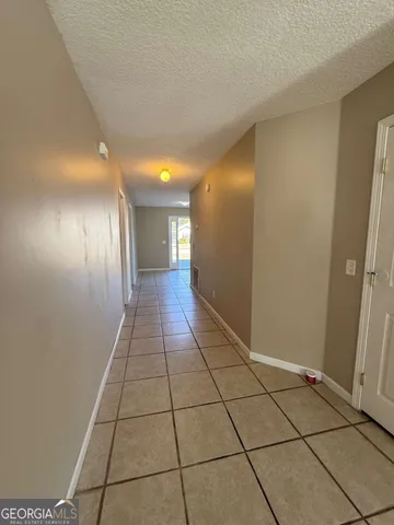 a view of hallway with a window