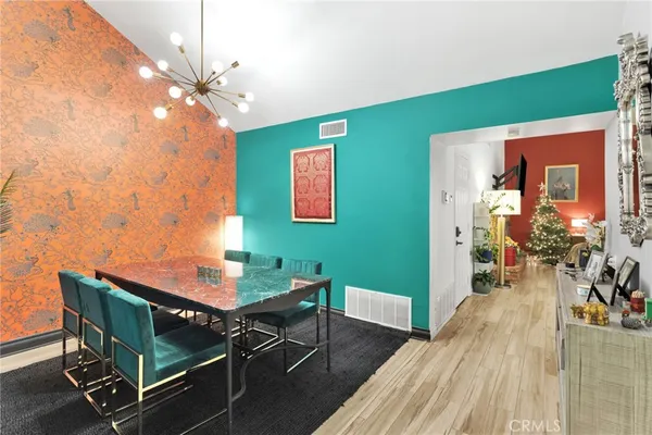 a room with furniture and wooden floor