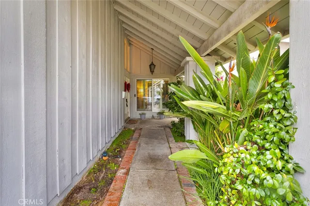 a view of a livingroom with furniture and hardwood floor