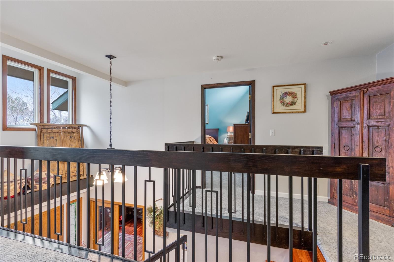 6674 Fairways Drive Longmont, CO 80503 - Photo 17 of 40 a view of a porch with wooden floor