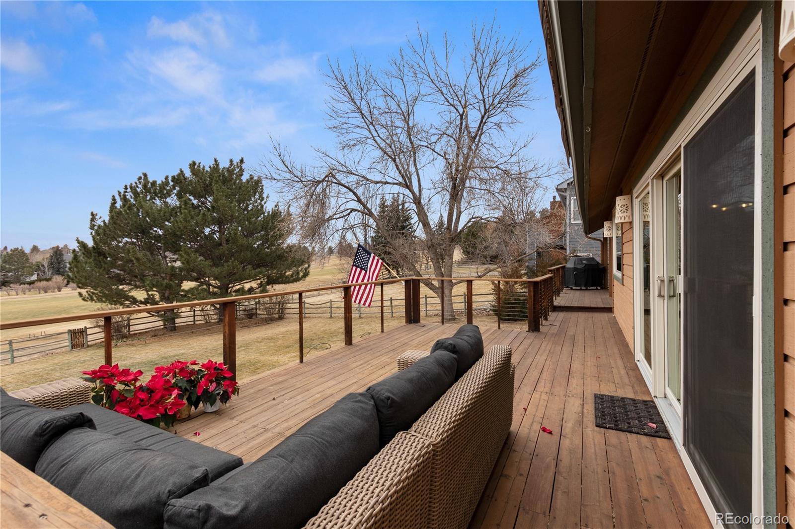 6674 Fairways Drive Longmont, CO 80503 - Photo 32 of 40 a view of outdoor living space with furniture and city view