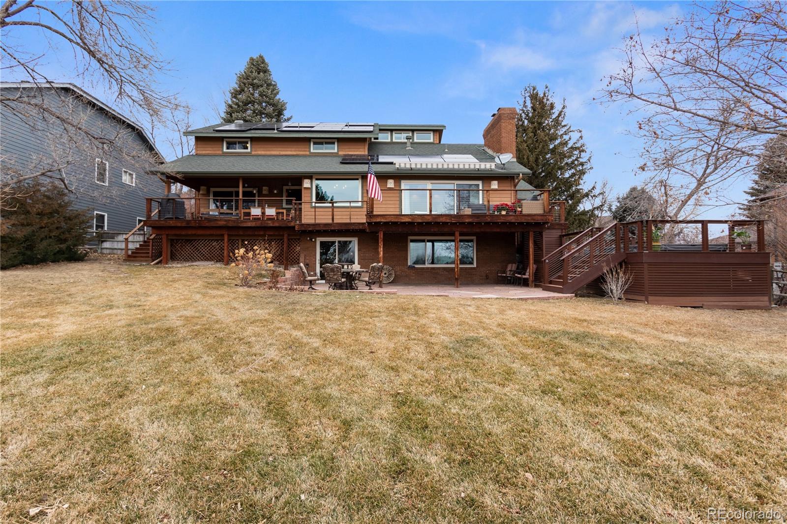 6674 Fairways Drive Longmont, CO 80503 - Photo 37 of 40 a view of house with a yard