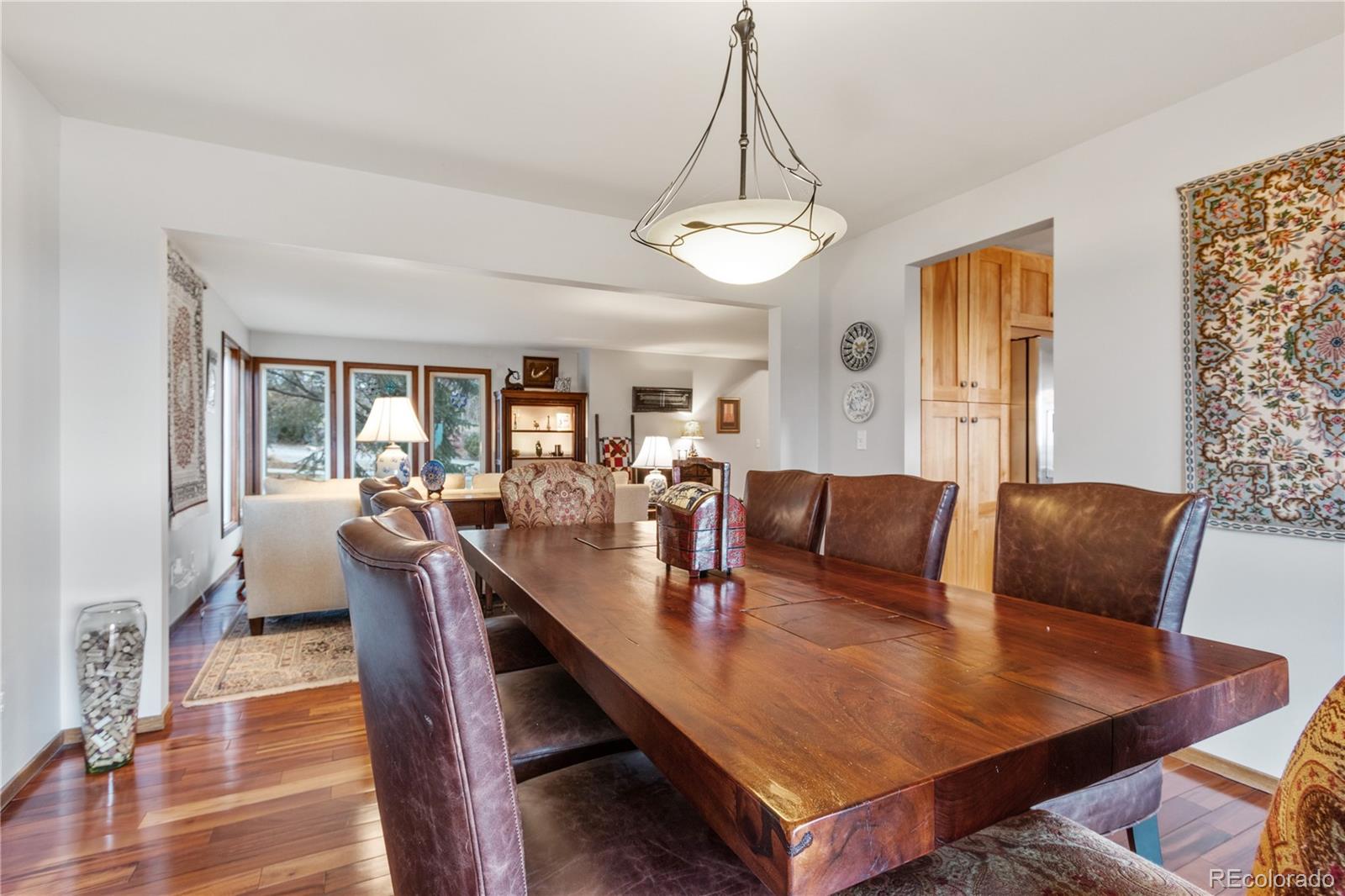 6674 Fairways Drive Longmont, CO 80503 - Photo 8 of 40 a view of a dining room with furniture