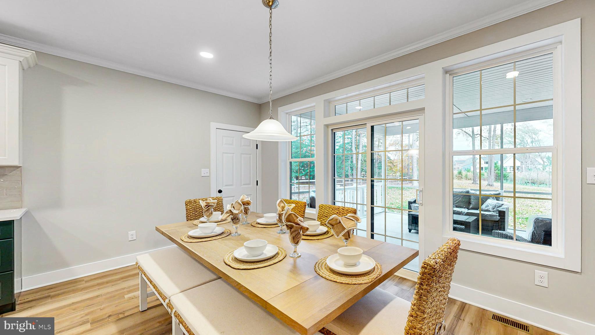 24558 Timber Branch Millsboro, DE 19966 - Photo 12 of 26 a view of a dining room with furniture window and outside view