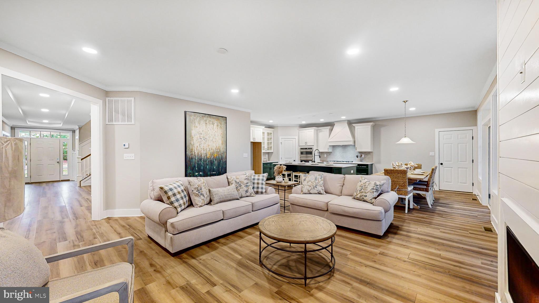 24558 Timber Branch Millsboro, DE 19966 - Photo 13 of 26 a living room with furniture and a wooden floor