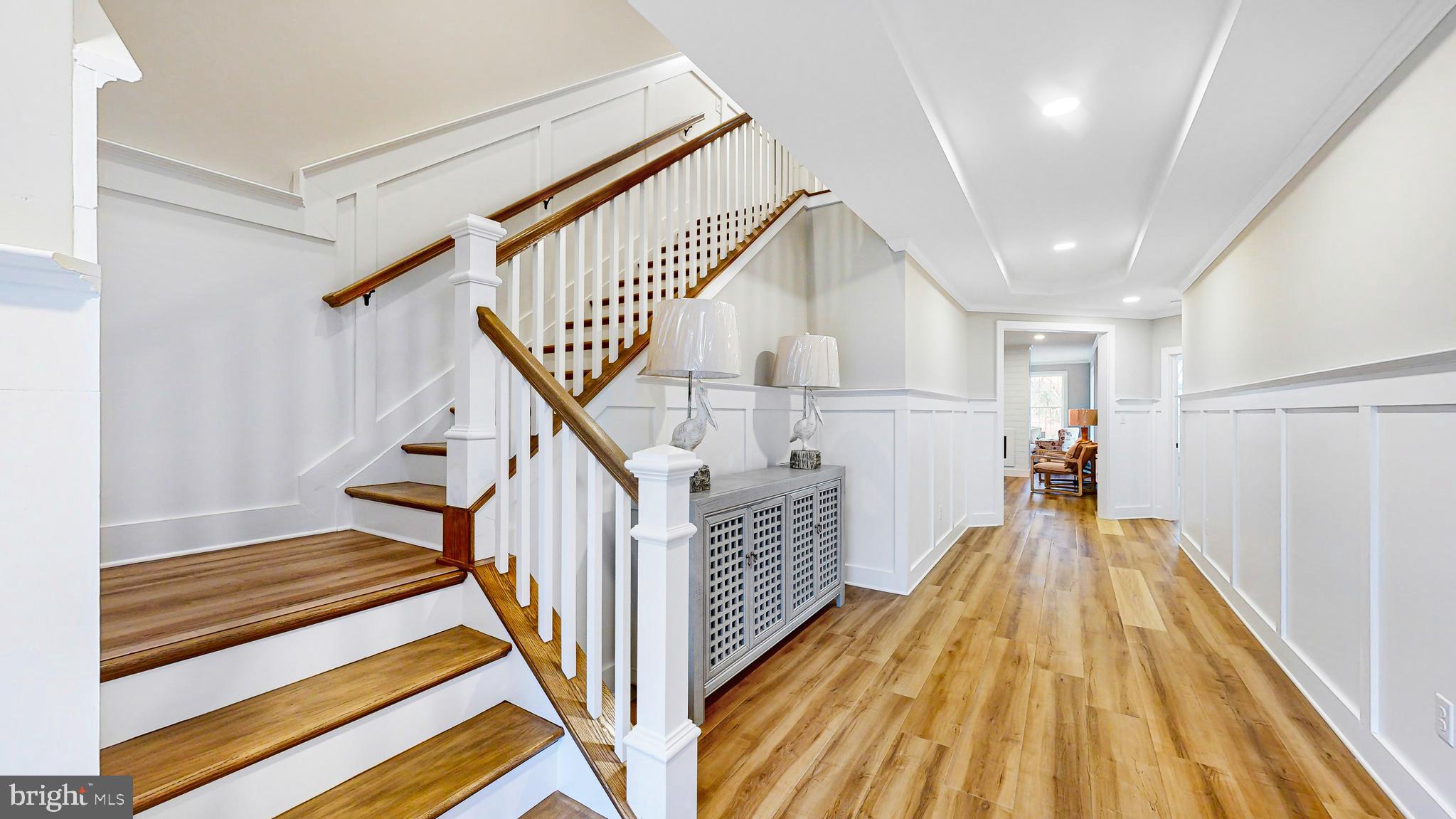 24558 Timber Branch Millsboro, DE 19966 - Photo 6 of 26 a view of entryway and hall with wooden floor