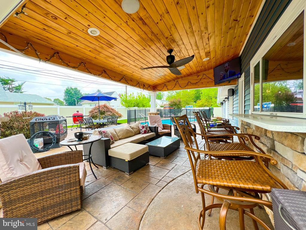 38 Spring Valley Road Levittown, PA 19056 - Photo 40 of 50 Rear covered Patio with flip out window for bar