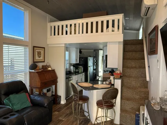 a kitchen with a stove and a microwave
