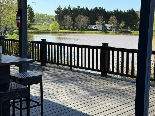 a view of a two chairs and table in the balcony