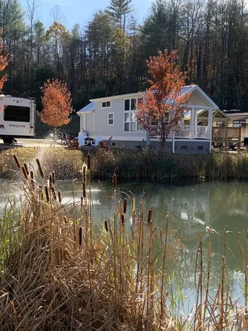 a car parked in front of white house