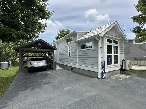 a view of a dining room with furniture and window