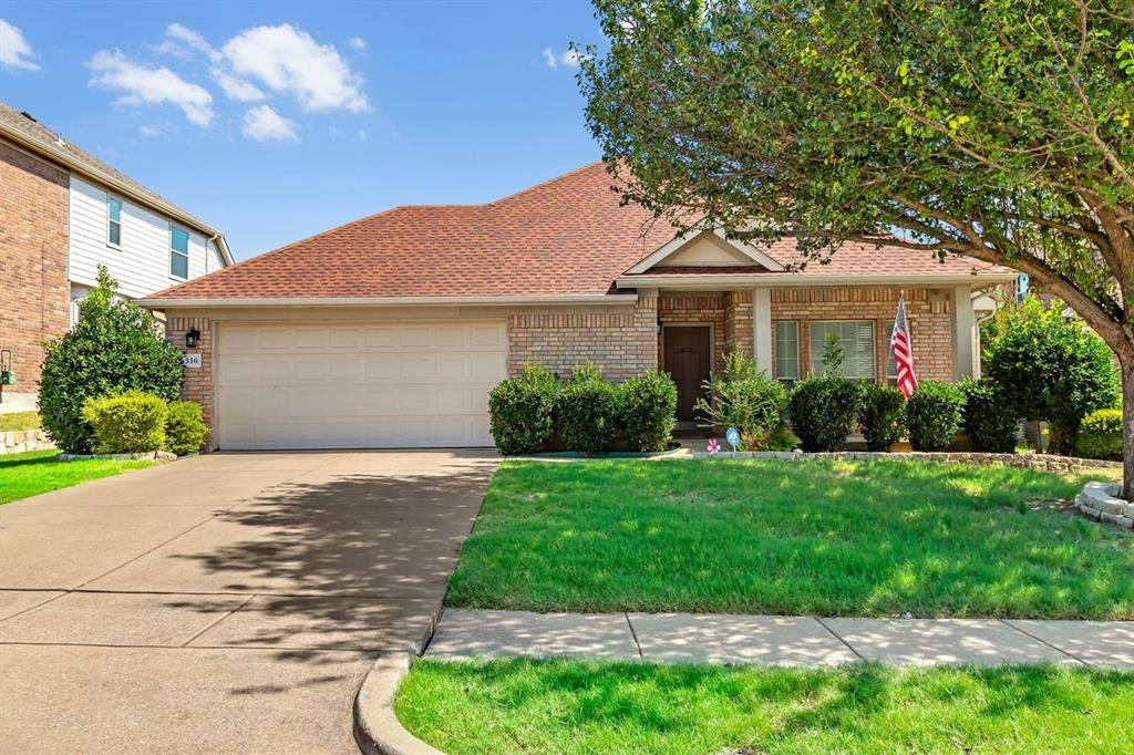 5316 Ridgeson Drive McKinney, TX 75071 - Photo 8 of 33 Brick exterior residence with a red-shingled roof and an attached two-car garage
