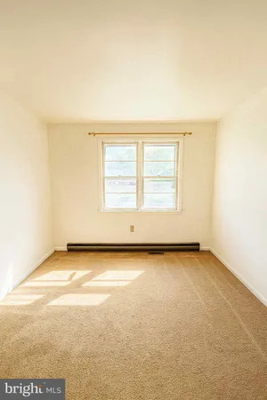 an empty room with a window