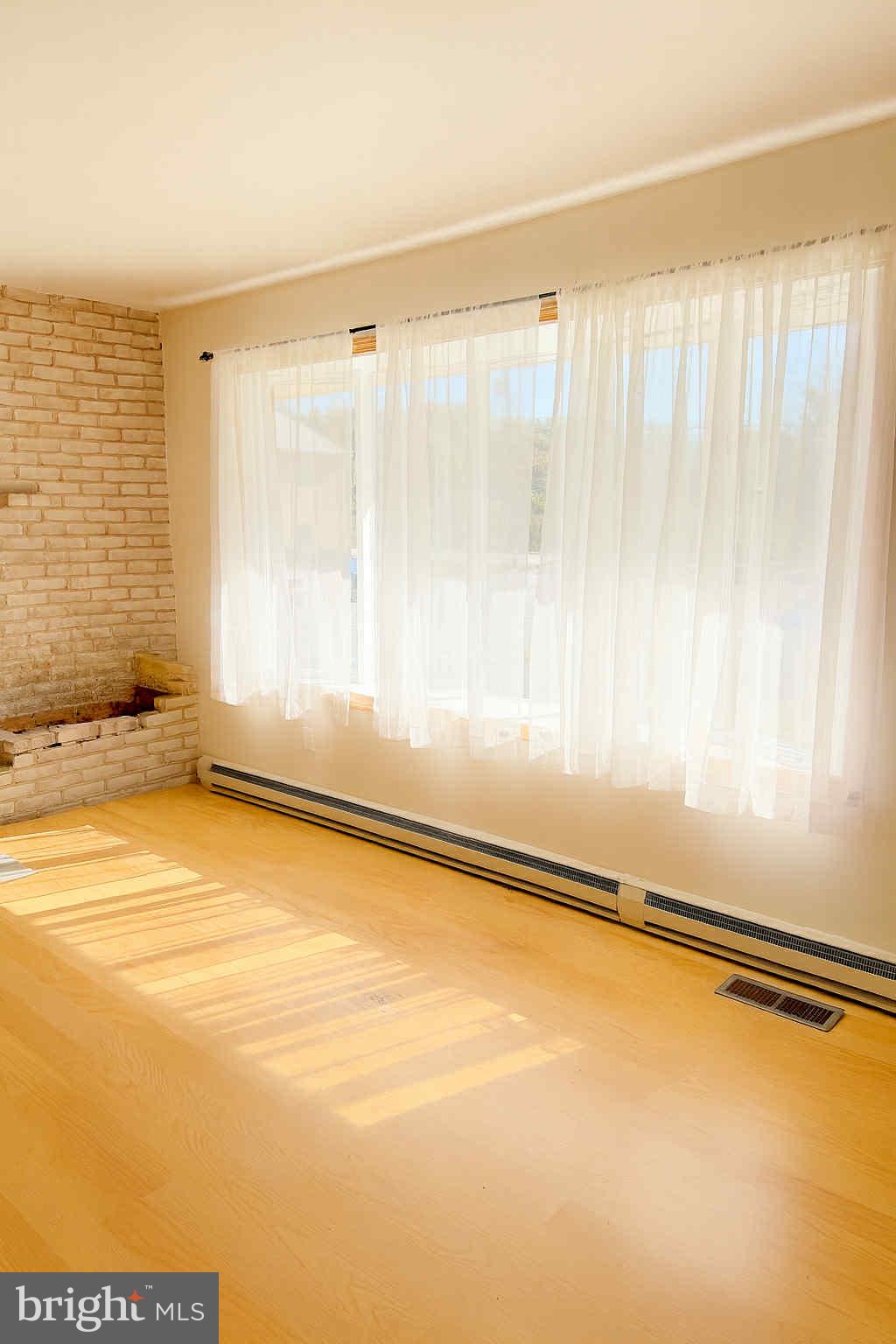 1536 West Trindle Road Carlisle, PA 17015 - Photo 6 of 15 a view of an empty room with a window