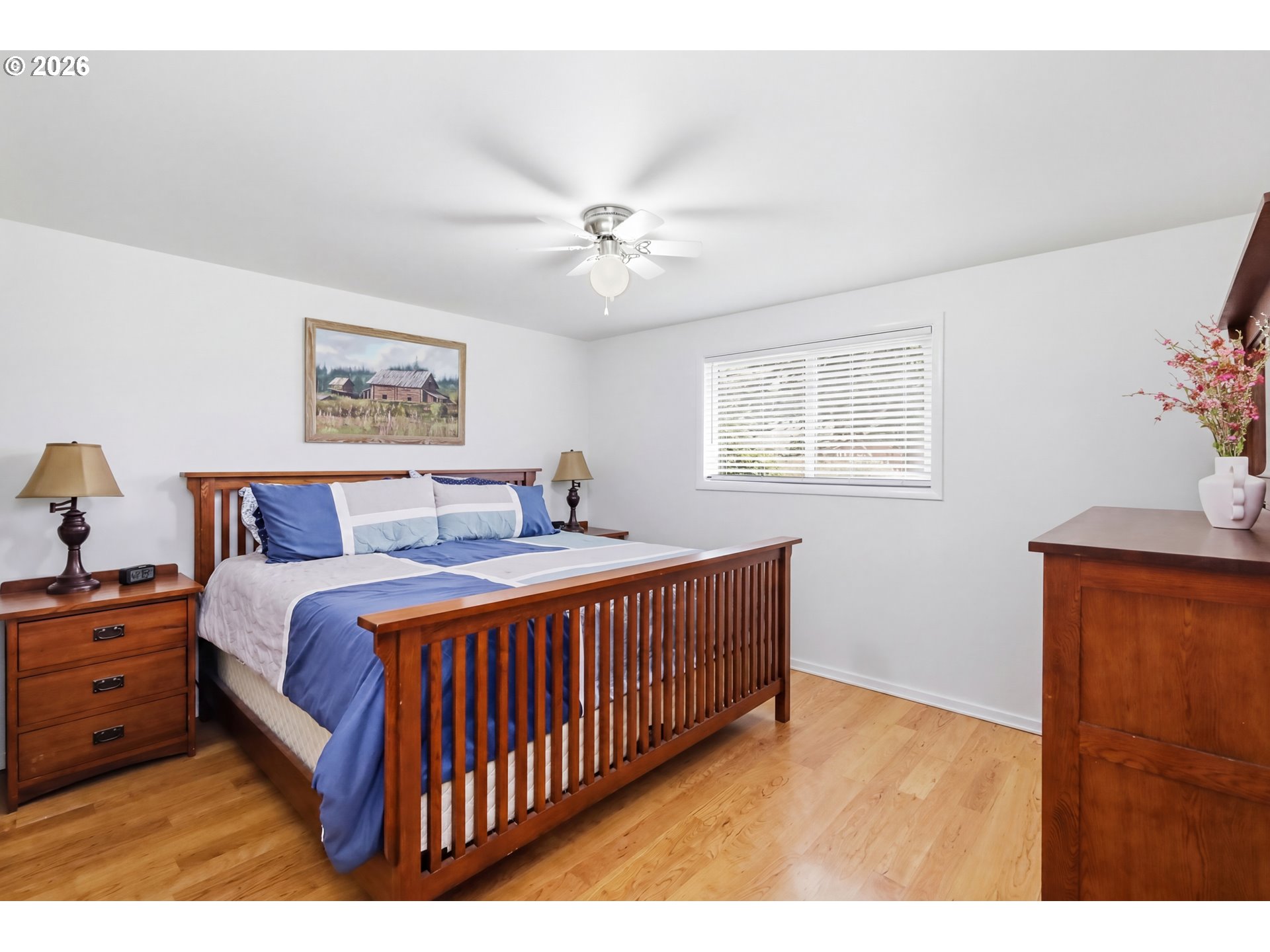 1125 Delrose Drive Springfield, OR 97477 - Photo 15 of 35 a bedroom with bed and window