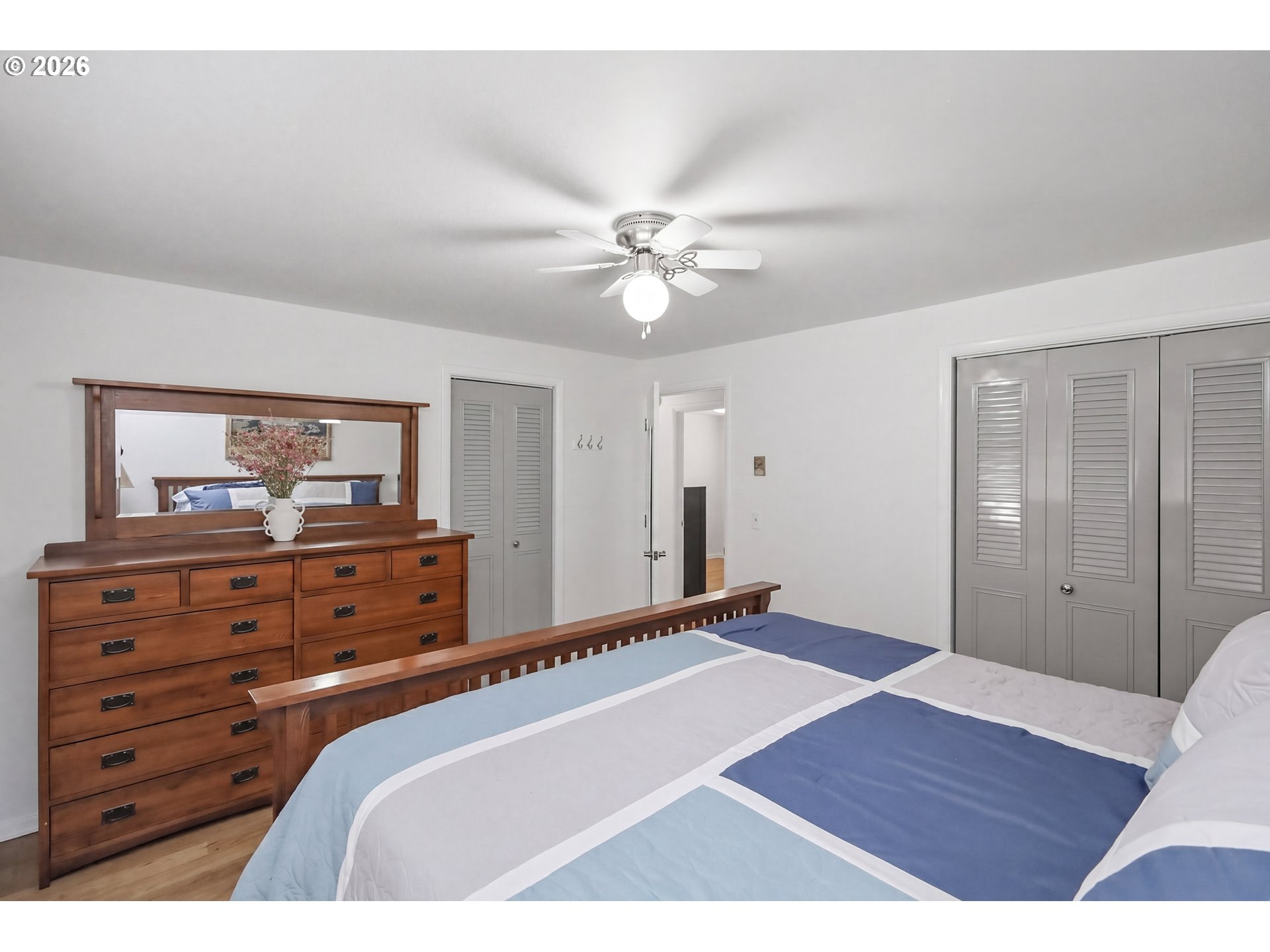 1125 Delrose Drive Springfield, OR 97477 - Photo 16 of 35 a bedroom with a bed and a dresser