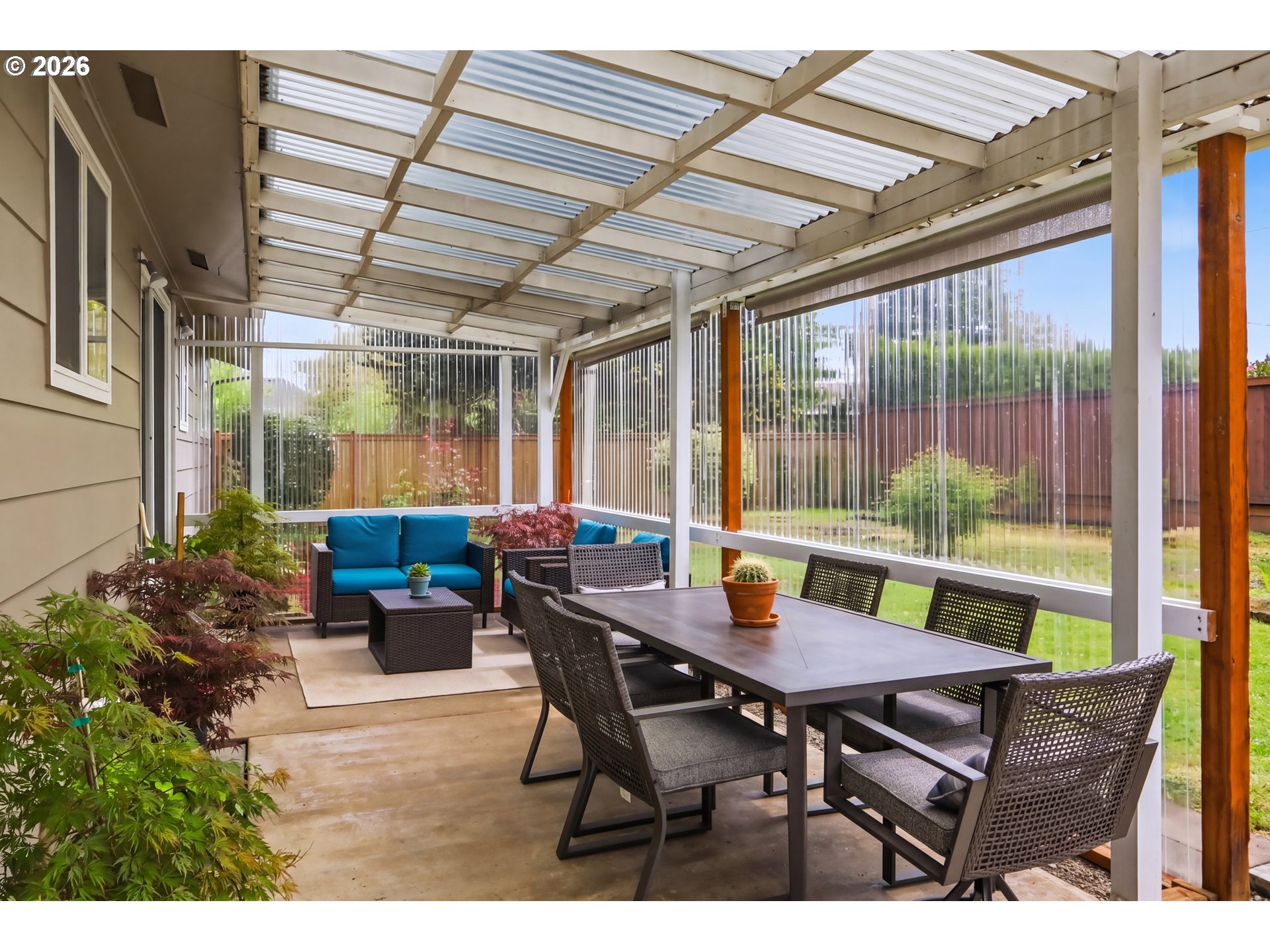 1125 Delrose Drive Springfield, OR 97477 - Photo 26 of 35 a view of an outdoor dining space with a table and chairs