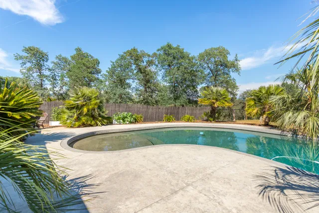 a view of outdoor space and swimming pool