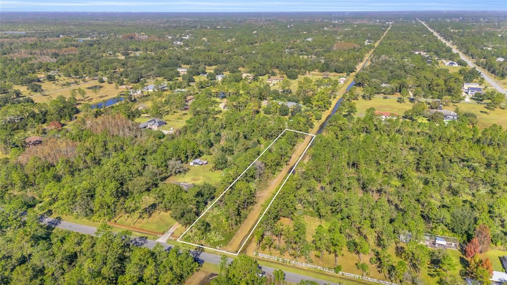 Quinlan Street Orlando, FL 32833 - Photo 11 of 40 a view of a city with lush green forest